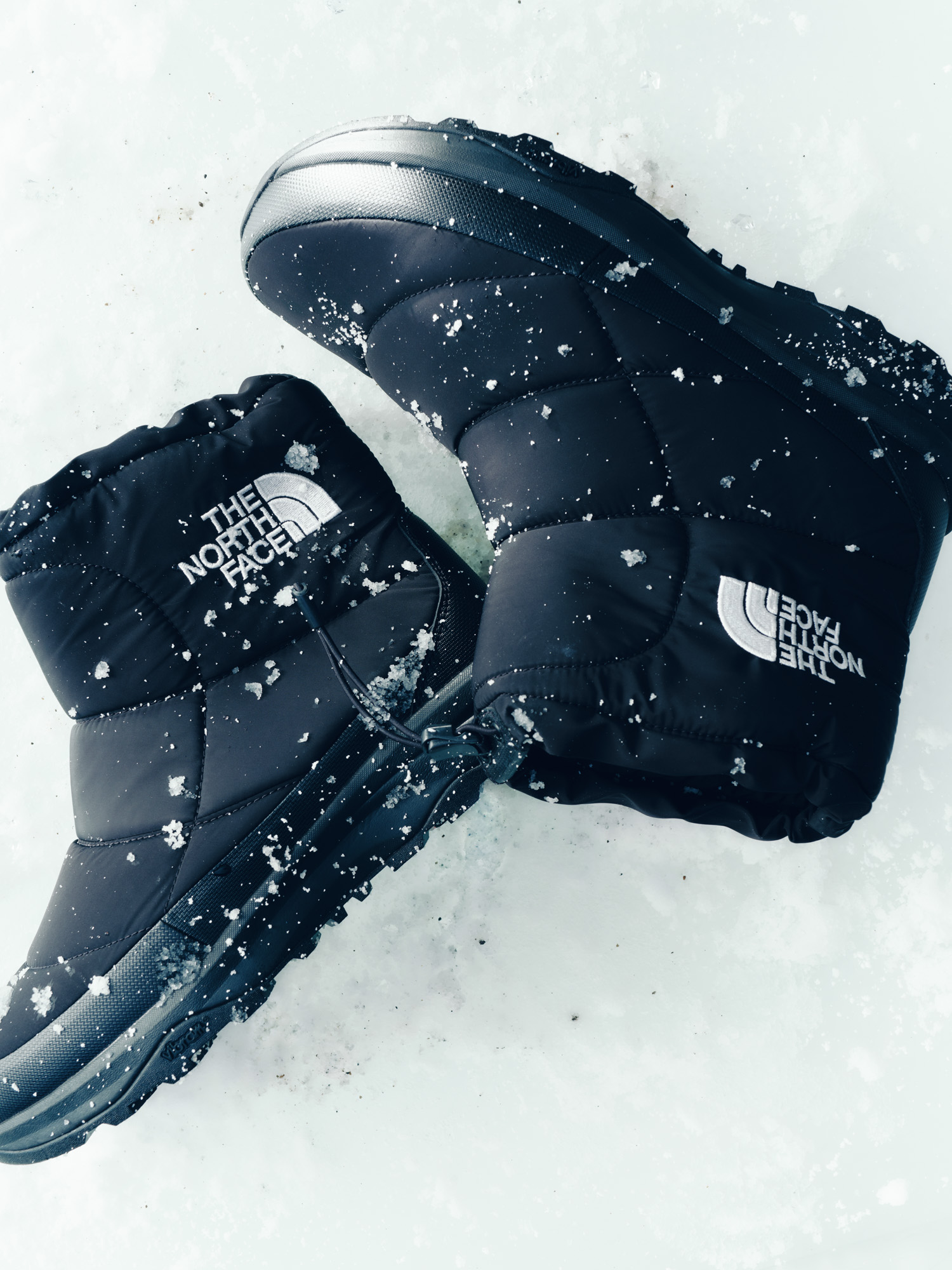 NUPTSE BOOTIE LOGO SHORT WP ARCTIC GRIP