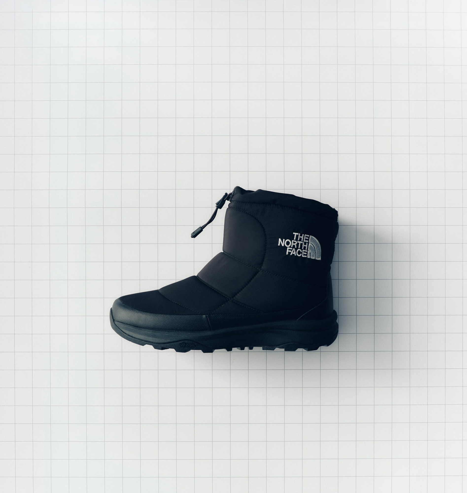 NUPTSE BOOTIE LOGO SHORT WP ARCTIC GRIP